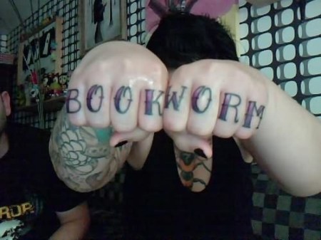 book-worm-tattoo-on-fingers